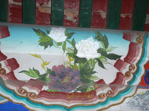Each piece of wood is painted.